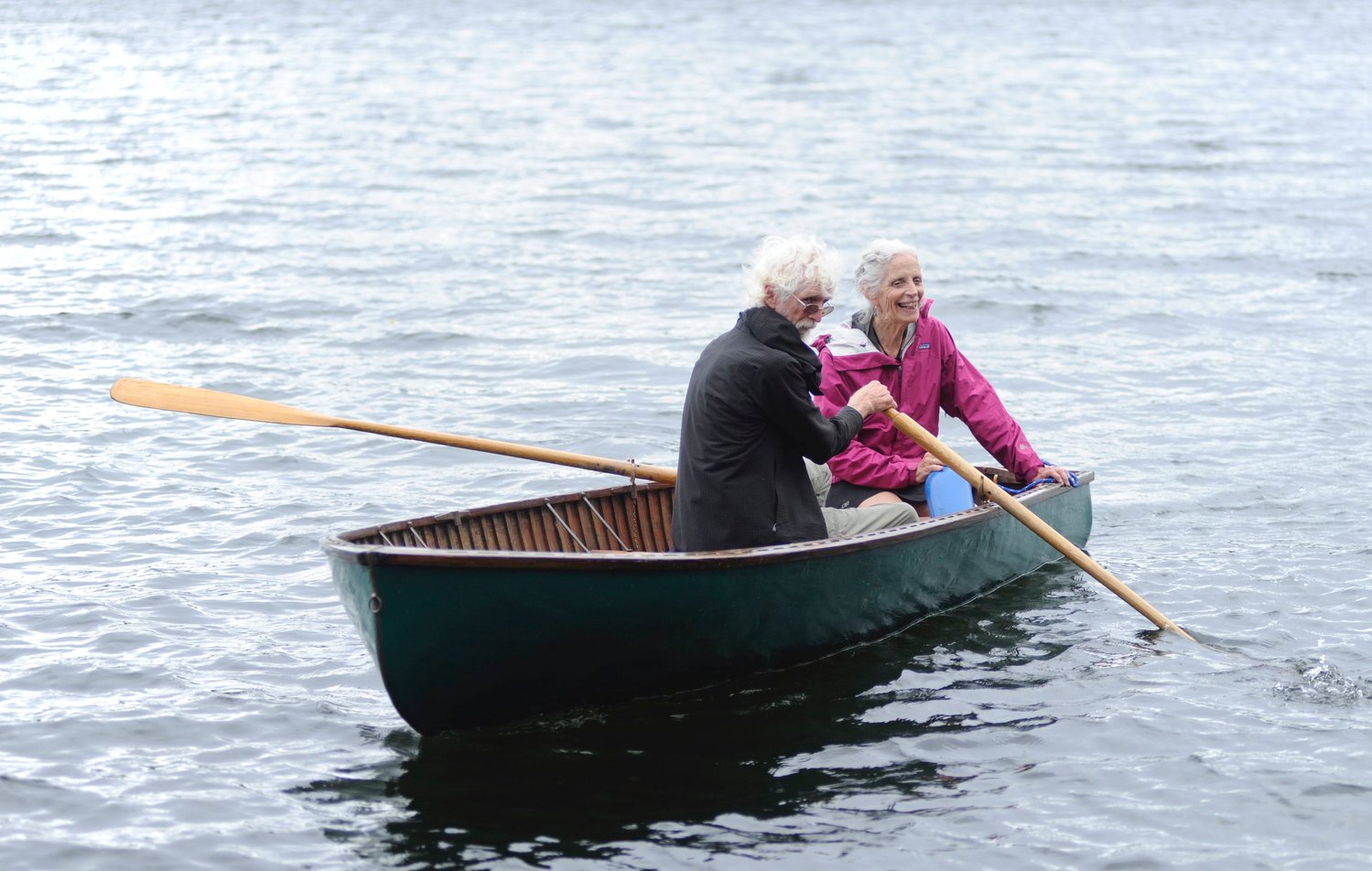 Safe passage. Zeke Boyle, master woodworker, restorer of vintage barns and co-founder of the Beechwoods Yacht Club, and his wife Ginny, navigated the chop on the lake from the public access to the café’s docks. The couple are pictured in a 1948 Penn Yan Cartopper, the club’s first restoration project.